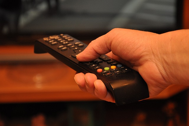 Browsing the IPTV Smarters Pro EPG and channel guide with a remote